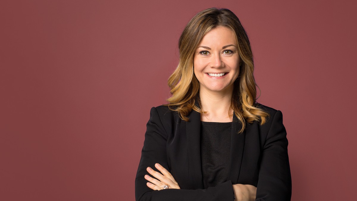 A woman smiling