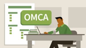 A graphic of a person at a laptop. The acronym OMCA is also presented.